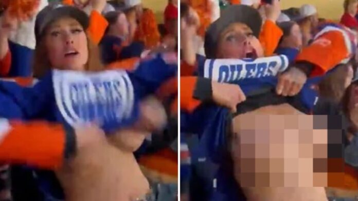 NHL fan flashes during Oilers game